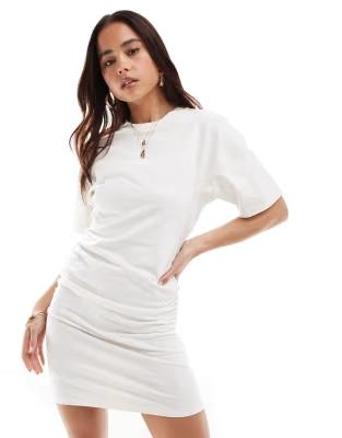 Crew neck mini t shirt dress with ruched sides in ivory. Size:UK8