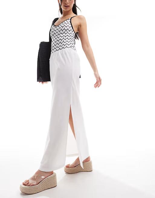 Collusion beach woven maxi skirt with bow in white. Size: M