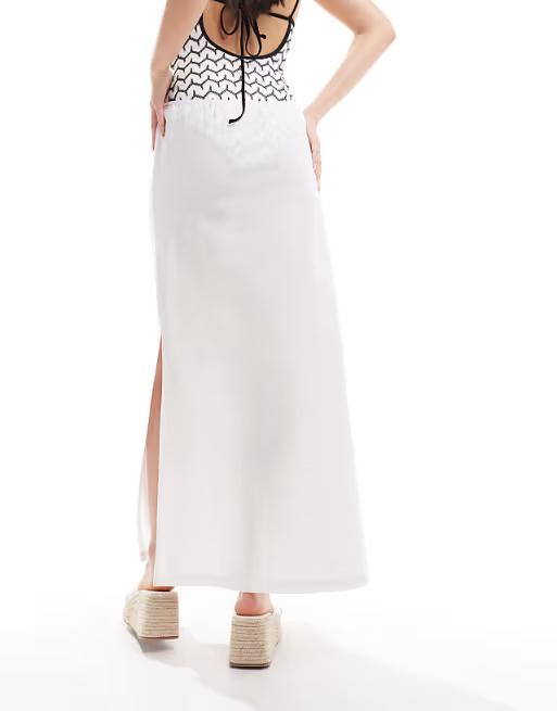 Collusion beach woven maxi skirt with bow in white. Size: M