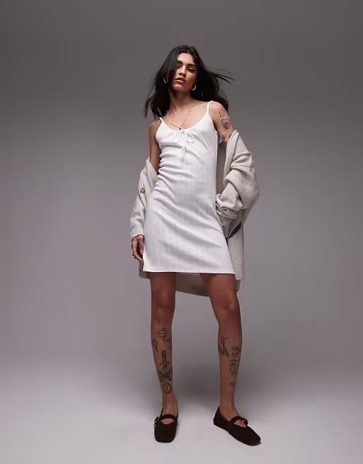 Topshop pointelle tie front mini dress in white. Size: S