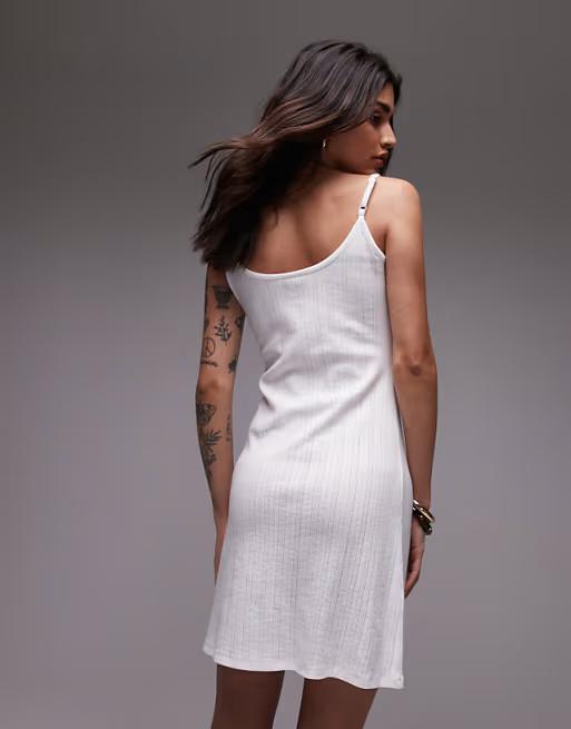 Topshop pointelle tie front mini dress in white. Size: S